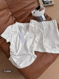 In-stock women's sports suit: polo shirt with shoulder pleats, waist-cinching slimming top, anti-exposure short skirt, yoga wear