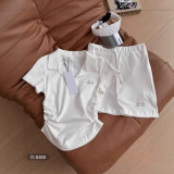 In-stock women's sports suit: polo shirt with shoulder pleats, waist-cinching slimming top, anti-exposure short skirt, yoga wear