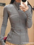 The same classic Define stand-up collar yoga top with original label, women's long-sleeve sports fitness jacket