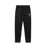 Trapstar's new rainbow gradient letter tiger head embroidery unisex hooded sports sweatshirt and jogger pants set