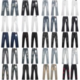 Purple Brand straight-leg micro-elastic jeans, vintage distressed with splatter paint and holes, slim-fit denim pants.