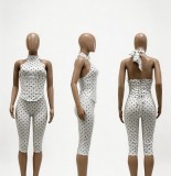 New cross-border European and American fashion women's clothing: halter neck polka dot fishbone waist-cinching zippered three-quarter jumpsuit (fake two-piece)