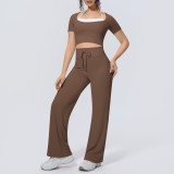 Cross-border solid color two-tone nude-feel high-elasticity faux two-piece yoga outfit set for women, suitable for sports, running, and fitness, short-sleeved two-piece set