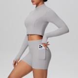 In-stock cross-border solid color brushed fabric nude-feel short jacket set with tight-fitting pocket shorts, two-piece fitness yoga outfit