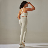 Cross-border European and American seamless knit solid color cross-back tight yoga outfit set with sports running fitness cropped pants