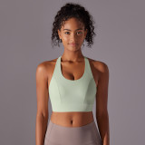 New seamless nude-feel solid color racerback sports bra with front clasp for sports, running, fitness, and yoga