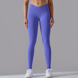 Cross-border European and American seamless knitted breathable solid color cross-waist peach butt yoga pants, running fitness cropped pants for women