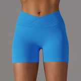 Cross-border European and American seamless knitted breathable solid color cross-waist peach butt yoga shorts for women, suitable for running and fitness
