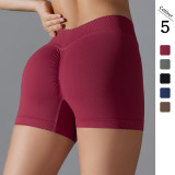 Cross-border seamless knitted solid color tight peach butt V-waist yoga shorts for women, suitable for sports, running, and fitness
