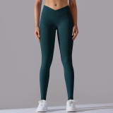 Cross-border European and American seamless knitted breathable solid color cross-waist peach butt yoga pants, running fitness cropped pants for women