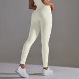 New European and American style seamless knit high-waisted tummy control yoga pants with a butt-lifting effect for sports, running, and fitness