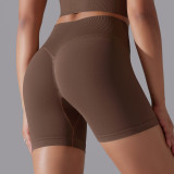 Cross-border European and American seamless solid color high-waisted butt-lifting tight high-elastic yoga shorts for women for sports, running, and fitness