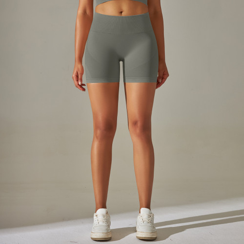 Cross-border European and American seamless knitted peach butt-lifting, tummy-controlling, high-waisted solid color yoga pants for sports, running, and fitness