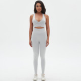 New cross-border seamless solid color tight-fitting sexy cross-back yoga outfit set for running and fitness, two-piece set