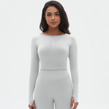 Cross-border European and American seamless knitted solid color tight-fitting high-elastic yoga top with long sleeves for women, suitable for sports, running, and fitness