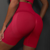 Cross-border European and American seamless knitted peach smiley face solid color breathable three-point yoga pants running fitness sports shorts for women