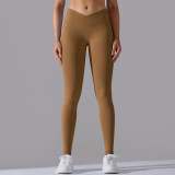 Cross-border European and American seamless knitted breathable solid color cross-waist peach butt yoga pants, running fitness cropped pants for women