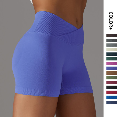 Cross-border European and American seamless knitted breathable solid color cross-waist peach butt yoga shorts for women, suitable for running and fitness