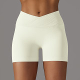 Cross-border European and American seamless knitted breathable solid color cross-waist peach butt yoga shorts for women, suitable for running and fitness