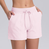 New solid color drawstring pocket yoga training tight yoga shorts, high elasticity sports running fitness three-quarter pants for women