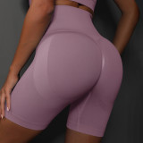 Cross-border European and American seamless knitted peach smiley face solid color breathable three-point yoga pants running fitness sports shorts for women