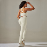 Cross-border European and American seamless knit solid color cross-back tight yoga outfit set with sports running fitness cropped pants