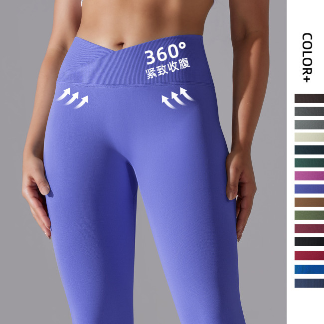 Cross-border European and American seamless knitted breathable solid color cross-waist peach butt yoga pants, running fitness cropped pants for women