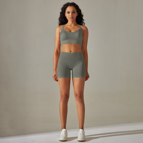 European and American cross-border seamless solid color cross-back sports bra and yoga outfit set with running fitness shorts two-piece set