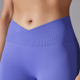 Cross-border European and American seamless knitted breathable solid color cross-waist peach butt yoga pants, running fitness cropped pants for women