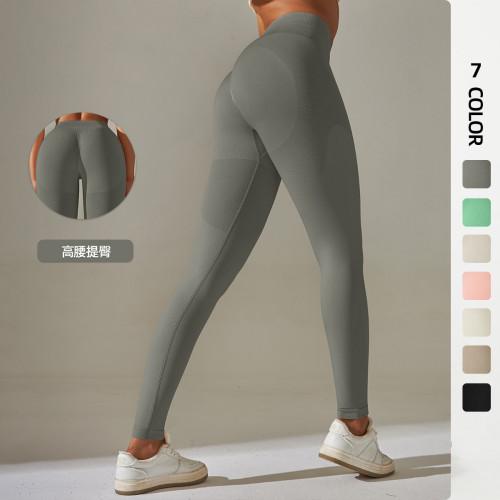 Cross-border European and American seamless knitted high-waisted butt-lifting peach-colored solid color yoga pants for sports, running, and fitness