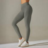 Cross-border European and American seamless knitted high-waisted butt-lifting peach-colored solid color yoga pants for sports, running, and fitness