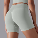Cross-border European and American seamless solid color high-waisted butt-lifting tight high-elastic yoga shorts for women for sports, running, and fitness