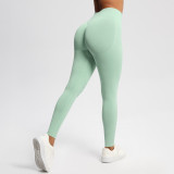 Cross-border European and American seamless solid color three-section waist butt-lifting high-waisted yoga pants for women for sports, running, and fitness