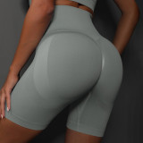 Cross-border European and American seamless knitted peach smiley face solid color breathable three-point yoga pants running fitness sports shorts for women
