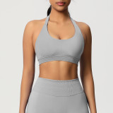Cross-border solid color seamless backless high-elasticity tight-fitting halter neck sports bra for running, fitness, and yoga for women