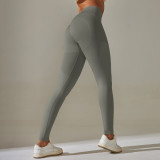 Cross-border European and American seamless knitted high-waisted butt-lifting peach-colored solid color yoga pants for sports, running, and fitness
