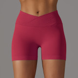 Cross-border European and American seamless knitted breathable solid color cross-waist peach butt yoga shorts for women, suitable for running and fitness