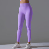 European and American cross-border seamless solid color peach-colored sports pants, tight-fitting running and fitness yoga wear, high-waisted butt-lifting yoga pants for women