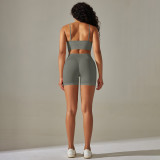 Cross-border European and American seamless solid color high-elastic tight-fitting peach-shaped back sports bra and yoga wear three-piece shorts set for women
