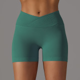Cross-border European and American seamless knitted breathable solid color cross-waist peach butt yoga shorts for women, suitable for running and fitness
