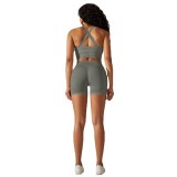 European and American cross-border seamless solid color cross-back sports bra and yoga outfit set with running fitness shorts two-piece set