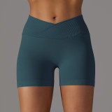 Cross-border European and American seamless knitted breathable solid color cross-waist peach butt yoga shorts for women, suitable for running and fitness
