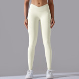 Cross-border European and American seamless knitted breathable solid color cross-waist peach butt yoga pants, running fitness cropped pants for women