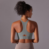 New seamless nude-feel solid color racerback sports bra with front clasp for sports, running, fitness, and yoga