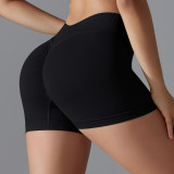 Cross-border seamless knitted solid color tight peach butt V-waist yoga shorts for women, suitable for sports, running, and fitness