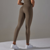 New European and American style seamless knit high-waisted tummy control yoga pants with a butt-lifting effect for sports, running, and fitness