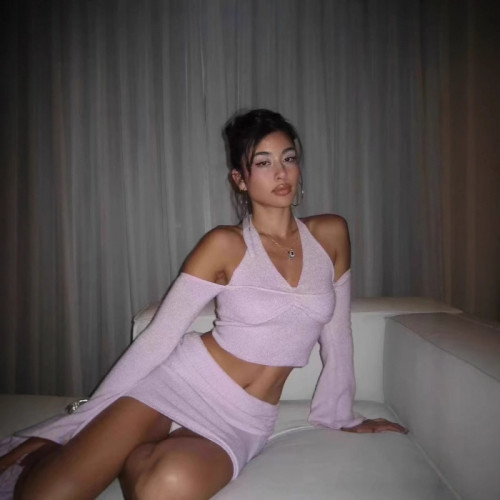 European and American hot girl light pink gentle and sexy knitted halter neck off-shoulder camisole top and short skirt set