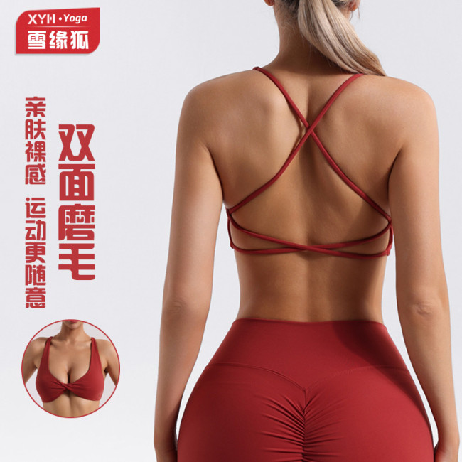 Cross-strap backless sports bra for women, with a nude feel, halter neck, with chest pads, suitable for cross-border yoga and fitness, tight-fitting sports bra