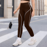 Popular color-blocked high-waisted ribbed yoga pants for women, suitable for running and fitness, peach butt tight-fitting sports leggings