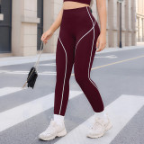 Popular color-blocked high-waisted ribbed yoga pants for women, suitable for running and fitness, peach butt tight-fitting sports leggings
